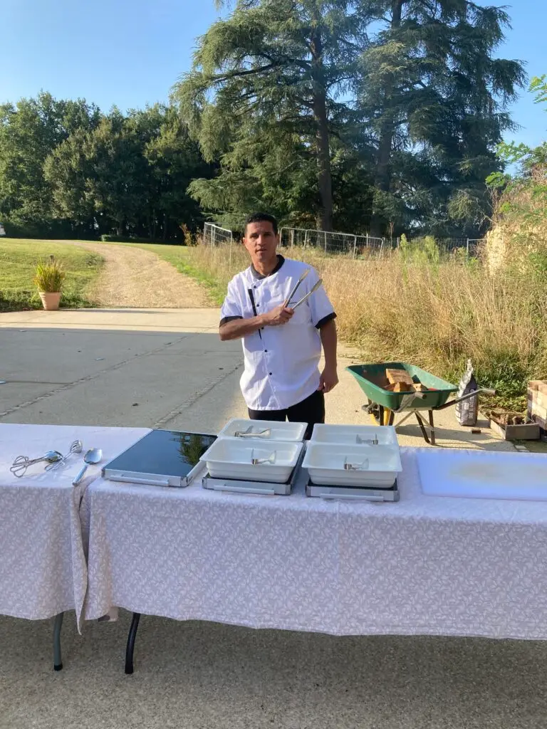 Chef Rogério at work — Brazilian ingredients and vibrant kitchen atmosphere